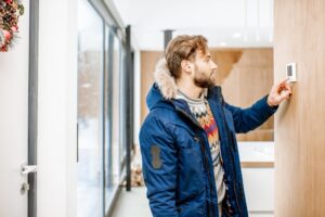 Cold Man facing HVAC Emergency