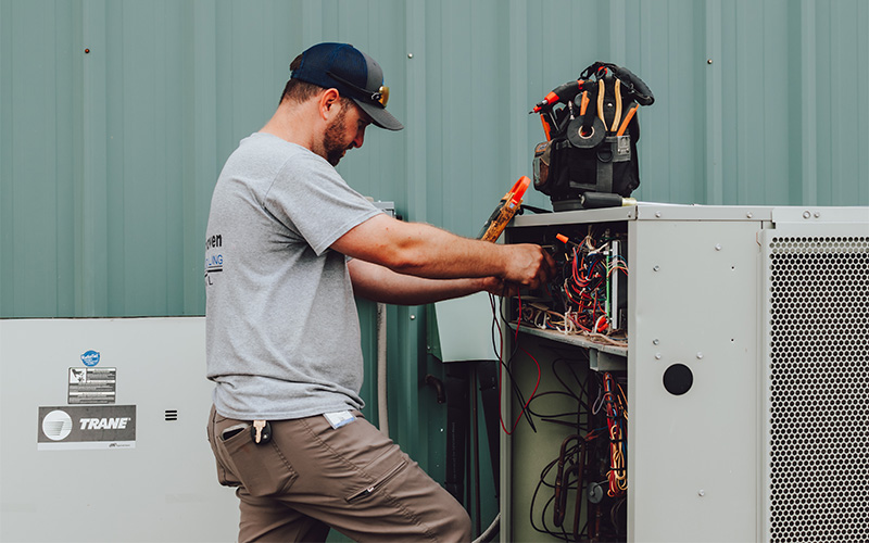 Freyaldenhoven tech working on hvac unit